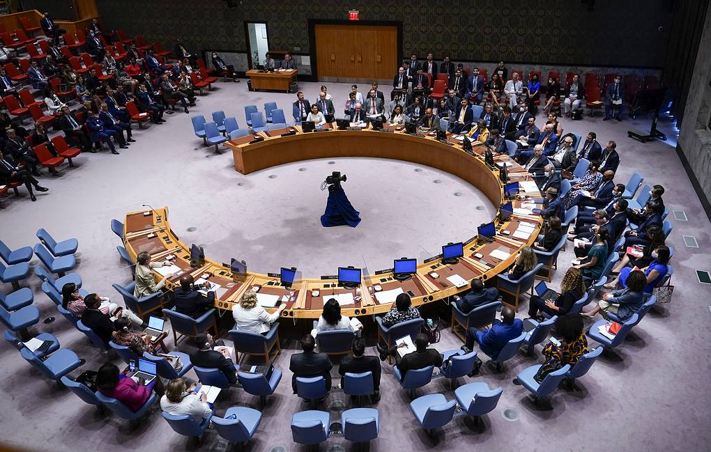 Russian Ambassador Vasily Nebenzya, second from left top, votes no on a procedural vote on whether to allow Ukrainian President Volodymyr Zelenskyy to address the Security Council meeting on threats to international peace and security via video link, Wednesday, Aug. 24, 2022, at United Nations headquarters. (AP Photo/Mary Altaffer)